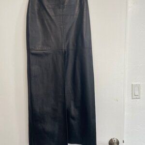 Bebe long leather skirt open in the front, size 2 .
